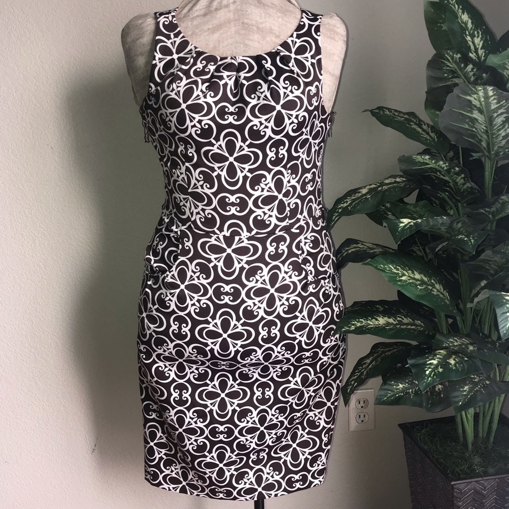 Brown and White London Times Size 4 :)